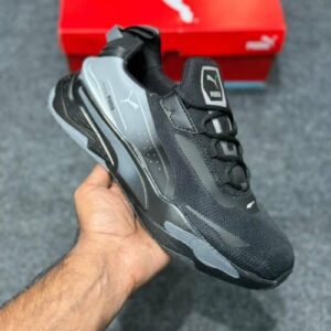 "Puma RS Fast Unmarked Black Grey sneakers showing side view with sleek design and premium finish."