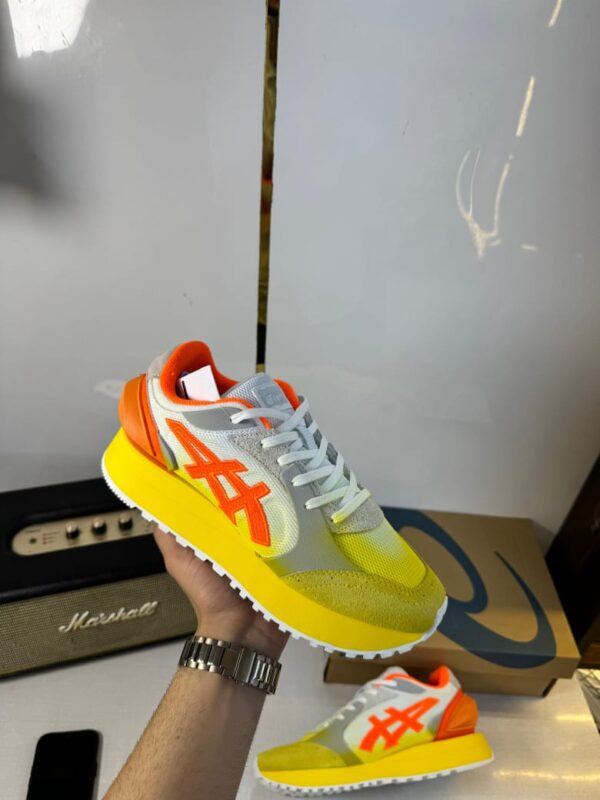 Front view of Onitsuka Tiger Moage showcasing sleek design