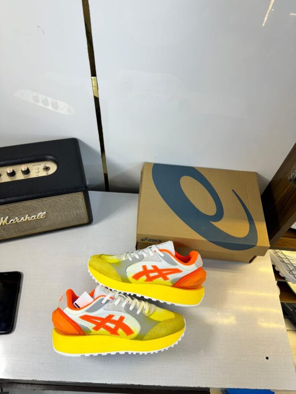 Front view of Onitsuka Tiger Moage showcasing sleek design