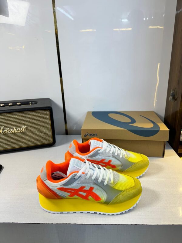 Front view of Onitsuka Tiger Moage showcasing sleek design