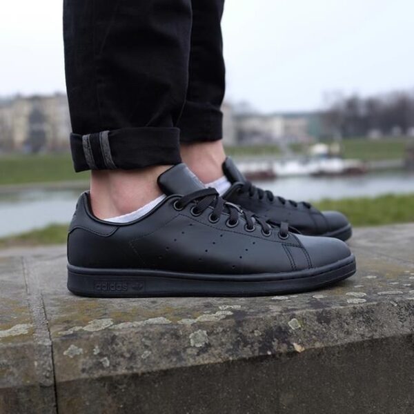 Side view of Adidas Stan Smith sneakers