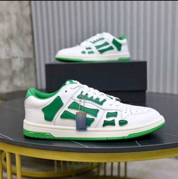 Front view of Amiri Skel Top Low White Green sneaker