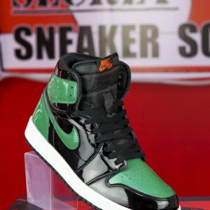 "Air Jordan Retro 1 Patent Miami sneaker featuring a sleek patent leather finish in vibrant Miami colors, displayed in its original box."