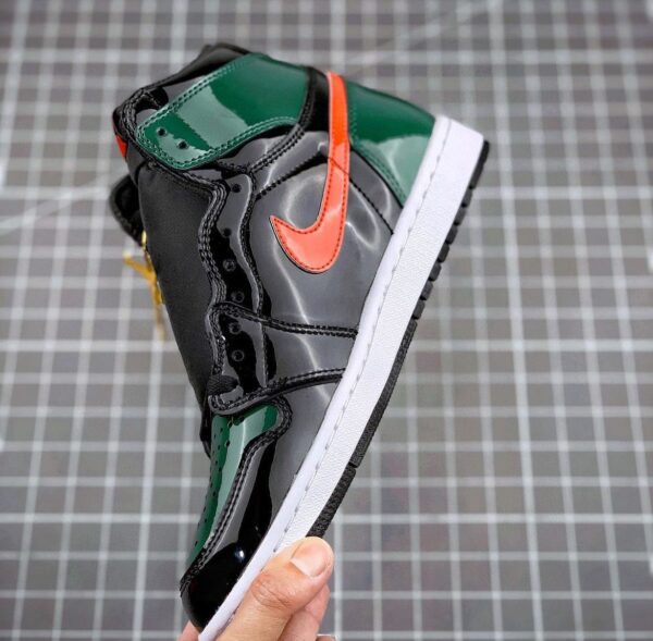 "Air Jordan Retro 1 Patent Miami sneaker featuring a sleek patent leather finish in vibrant Miami colors, displayed in its original box."