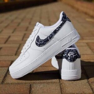 Lifestyle shot of Nike Airforce 1 Paisley White Black being worn outdoors