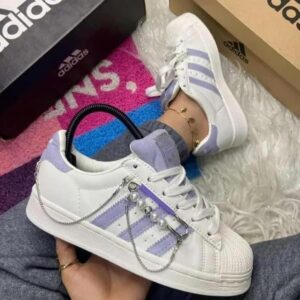 "Front view of Adidas Superstar Chain sneakers for girls, featuring a stylish chain detail."