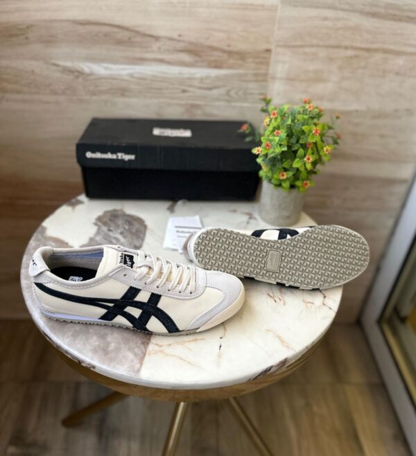 "Front view of Onitsuka Tiger Trainers Leather showcasing sleek design and premium leather material"