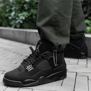 Air Jordan Retro 4 Black Cat sneakers in black color, featuring a sleek design and semi UA quality.