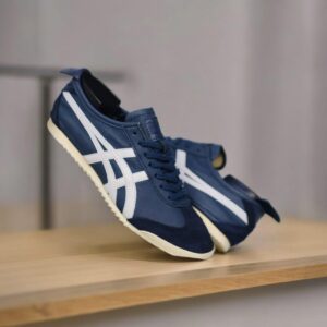 Onitsuka Tiger Mexico 66 Deluxe Nippon Navy Blue First Leather Sneakers for Men, showcasing a classic design and premium quality.