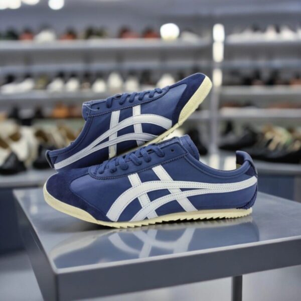 Onitsuka Tiger Mexico 66 Deluxe Nippon Navy Blue First Leather Sneakers for Men, showcasing a classic design and premium quality.