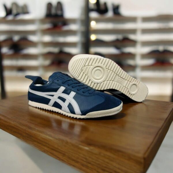 Onitsuka Tiger Mexico 66 Deluxe Nippon Navy Blue First Leather Sneakers for Men, showcasing a classic design and premium quality.