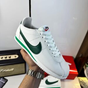 Front view of Nike Cortez George Green sneakers.