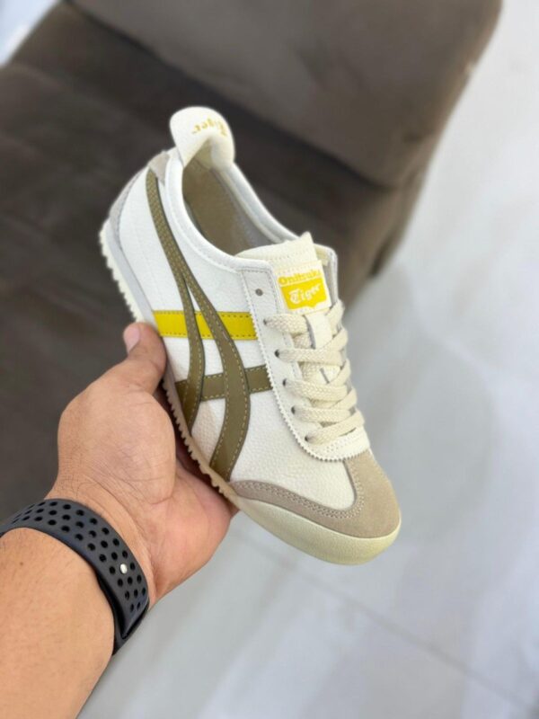 Front view of Onitsuka Tiger Mexico 66 Cream Rover sneakers.