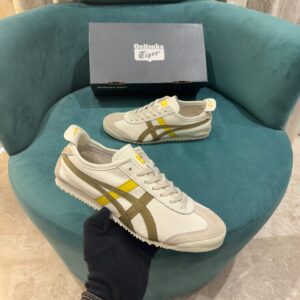 Front view of Onitsuka Tiger Mexico 66 Cream Rover sneakers.