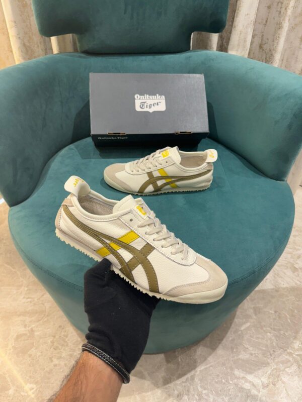 Front view of Onitsuka Tiger Mexico 66 Cream Rover sneakers.