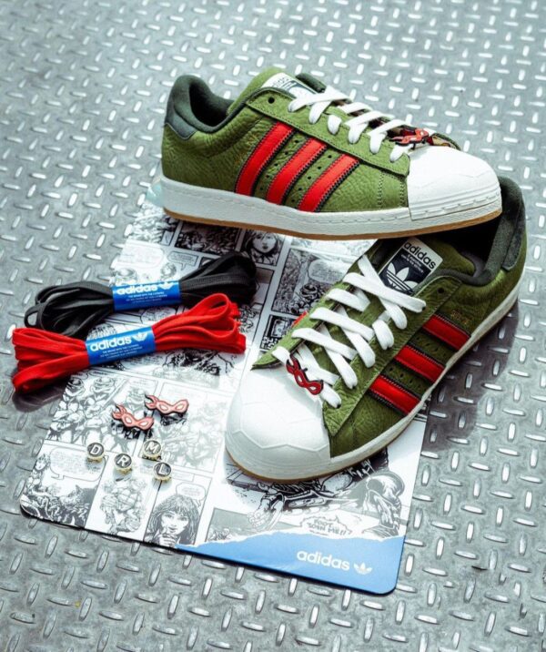 Top view of Adidas Superstar Sheltoe Teenage Mutant Ninja Turtles green red sneakers