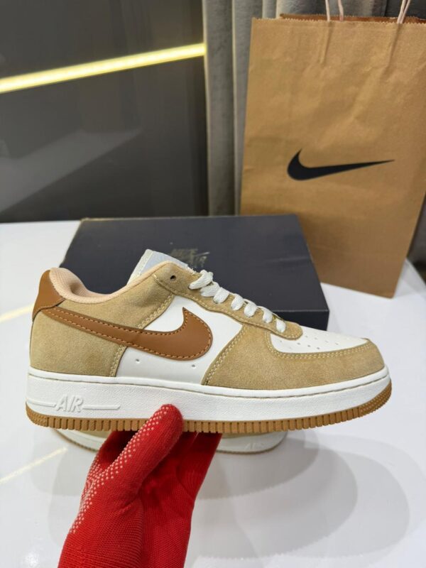 Side view of Nike Airforce 1 Vachetta Tan showcasing premium leather.