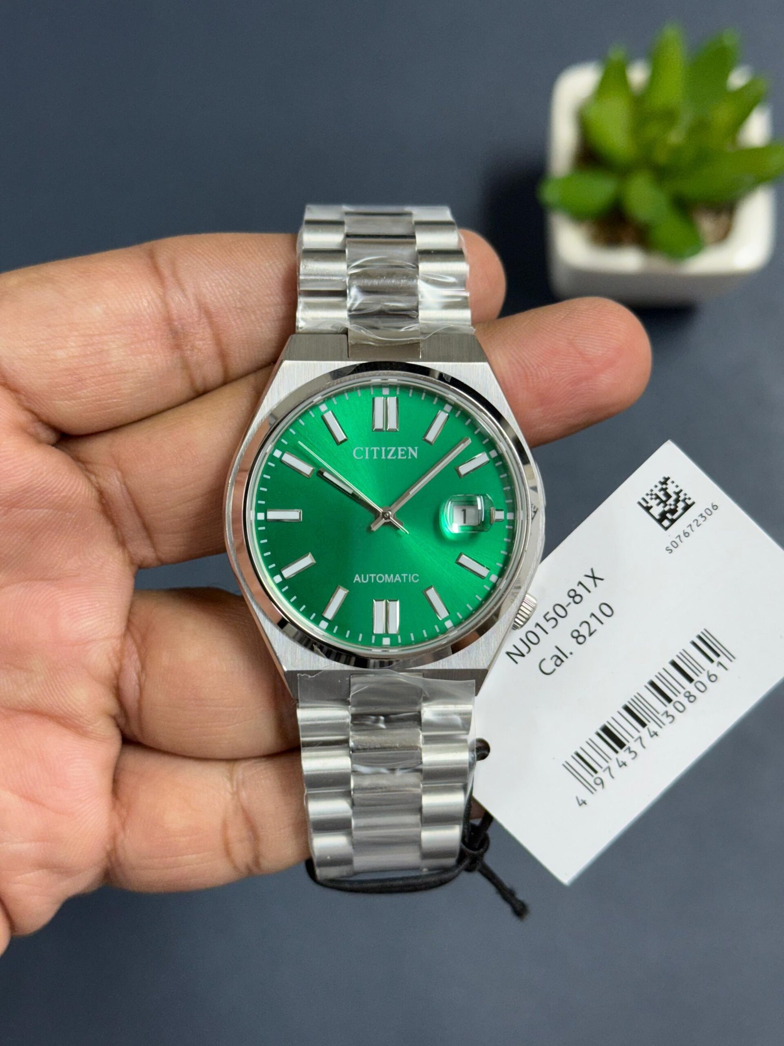 37d59e70-b188-4ca3-9ed2-90232d94fe79 Citizen NJ0150-81X Automatic Men’s Watch – Green Sunburst Dial, Sapphire Crystal, Integrated Steel Bracelet https://mfbuddy.com/