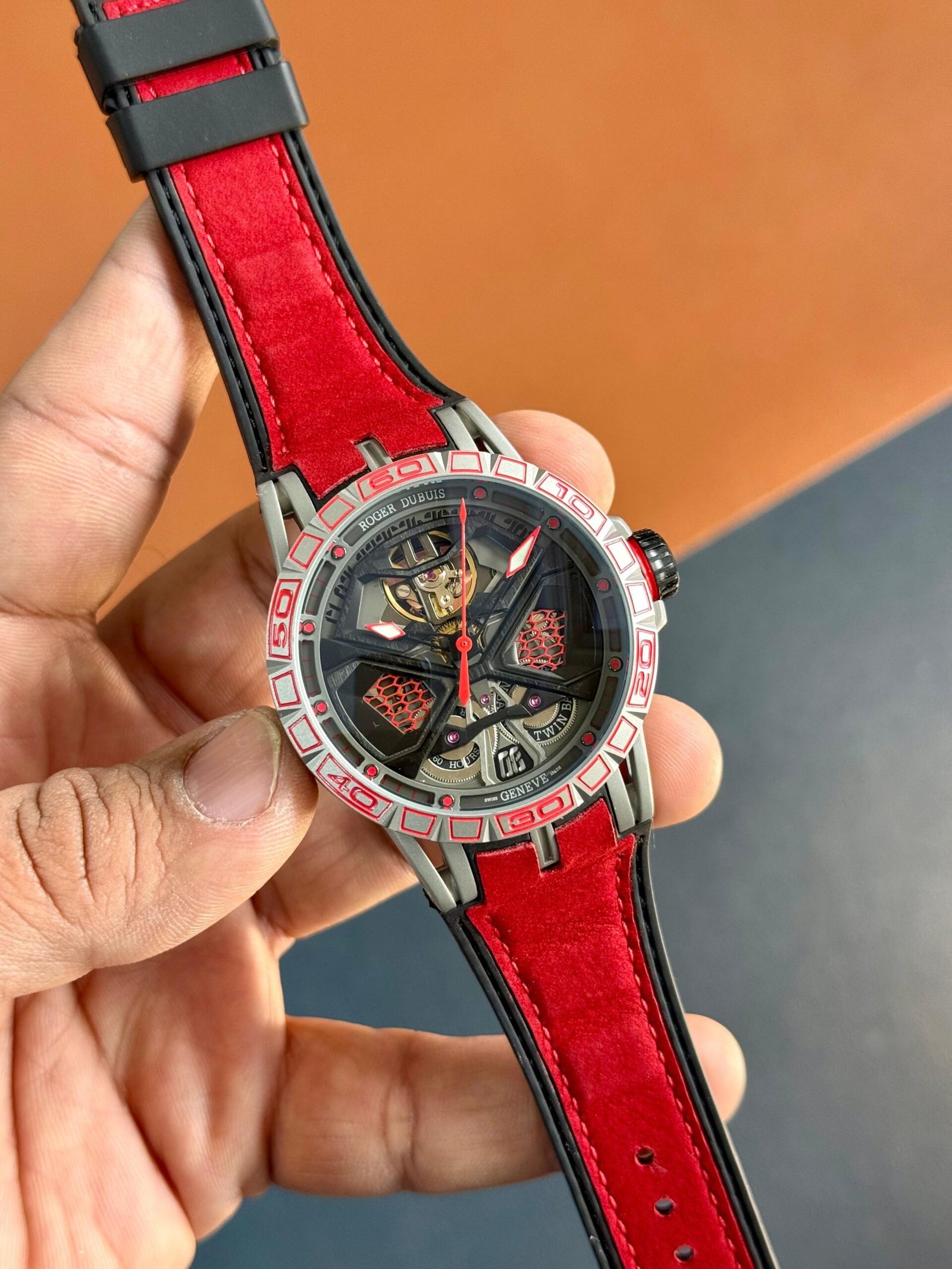 Roger Dubuis Excalibur Spider Huracán Monobalancier automatic skeleton watch with black rubber strap and red accents.