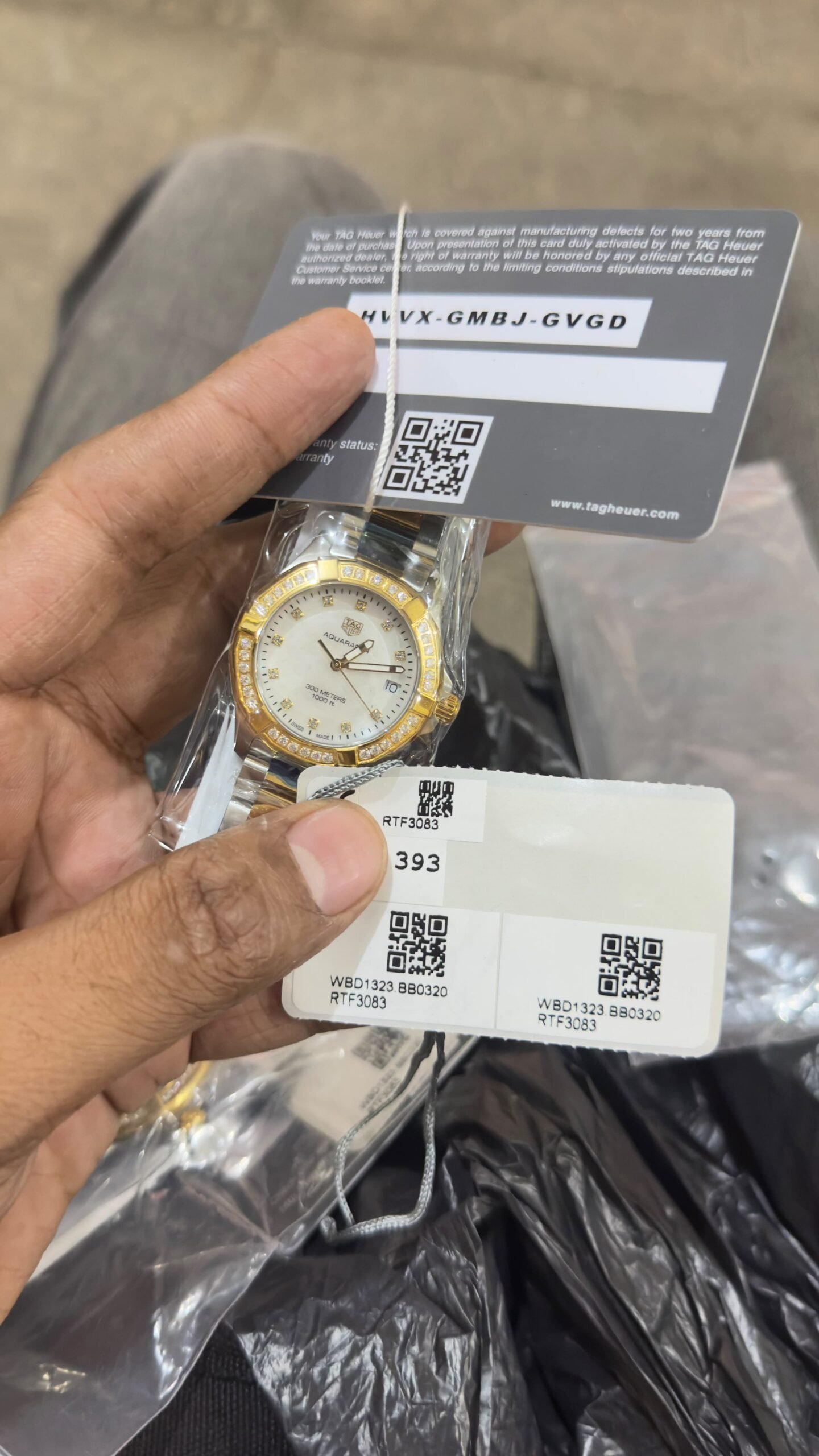 WhatsApp Image 2026-07-14 at 12.42.31 TAG Heuer Aquaracer Lady Diamond Watch WBD1323.BB0320 with Mother-of-Pearl Dial and Gold Bezel